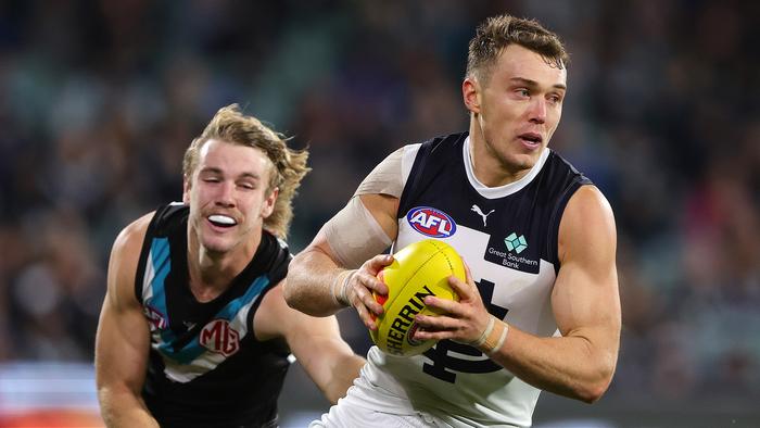 ADELAIDE, AUSTRALIA - MAY 30: Patrick Cripps of the Blues and Jason Horne-Francis of the Power during the 2024 AFL Round 12 match between the Port Adelaide Power and the Carlton Blues at Adelaide Oval on May 30, 2024 in Adelaide, Australia. (Photo by Sarah Reed/AFL Photos via Getty Images)