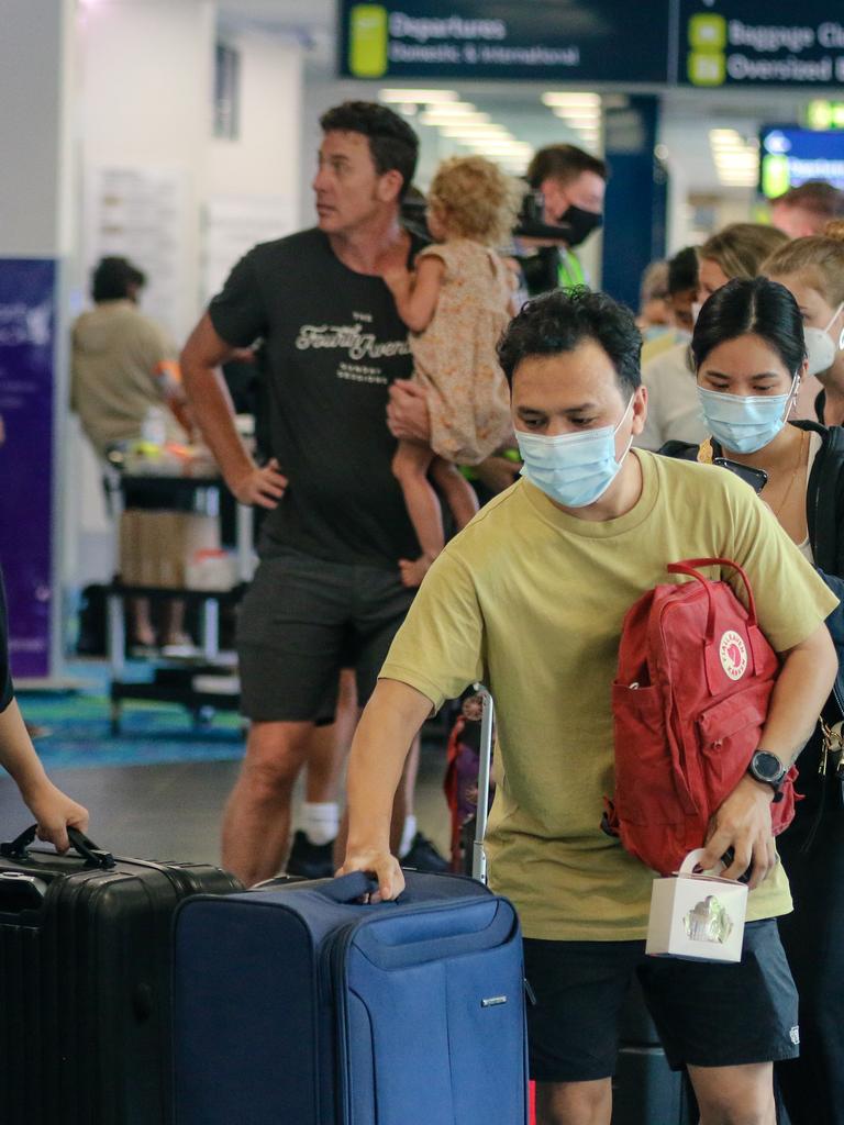 A packed check in counter as the First Singapore Airlines regular service lands in Darwin today. Picture: Glenn Campbell