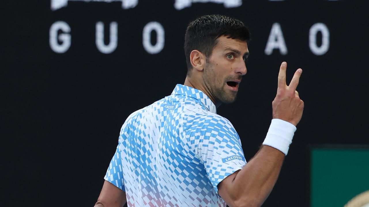 MELBOURNE, AUSTRALIA - JANUARY 23: Novak Djokovic of Serbia reacts during the fourth round singles match against Alex de Minaur of Australia during day eight of the 2023 Australian Open at Melbourne Park on January 23, 2023 in Melbourne, Australia. (Photo by Mark Kolbe/Getty Images)