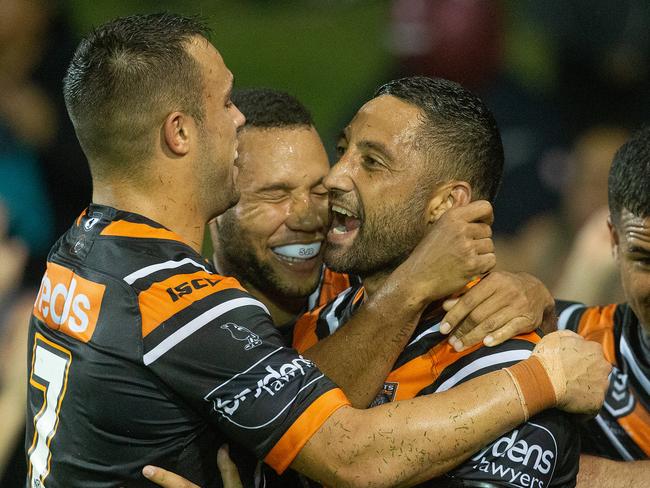 Benji Marshall of the Tigers (centre) reacts to Make Fonua scoring a try during the Round 2 NRL match between the Wests Tigers and the New Zealand Warriors at Campbelltown Stadium, Sydney, Sunday, March 24, 2019. (AAP Image/Steve Christo) NO ARCHIVING, EDITORIAL USE ONLY