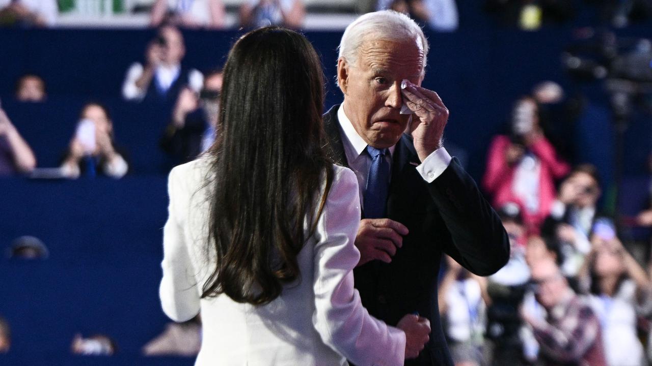 US President Joe Biden gets emotional as his daughter Ashley Biden welcomes him to the stage on the first day of the Democratic National Convention (DNC). Picture: Brendan Smialowski/AFP