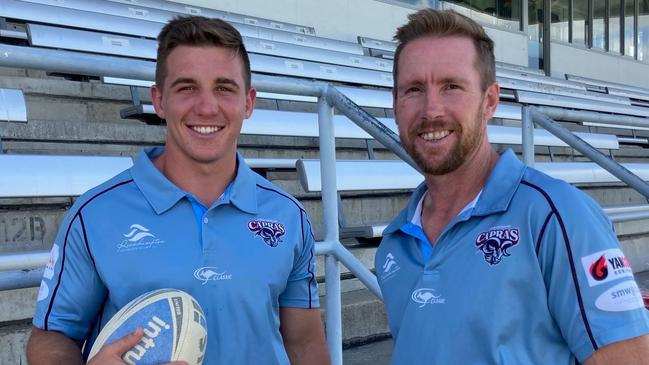 CQ Capras head coach Guy Williams (right) with new recruit Tyler Szepanowski.