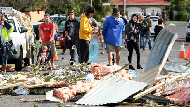 Locals surveyed the debris and destruction in the hours after it hit.