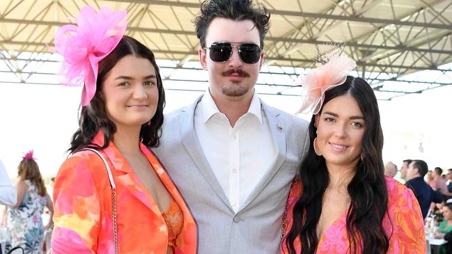 Kobie Roberts, Alec Buchanan and Kasey McConnell at Ladies Oaks Day, Caloundra. Picture: Patrick Woods.