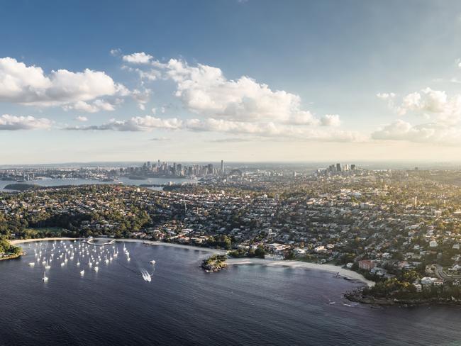 Stunning high angle aerial drone view of Balmoral Beach and Edwards Beach in the suburb of Mosman, Sydney, New South Wales, Australia. CBD, North Sydney and Chatswood in the background left to right.