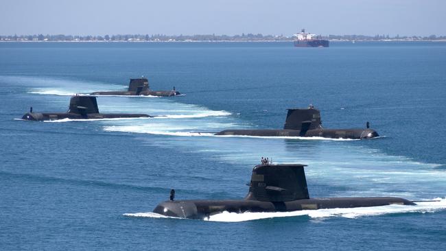 Australian Collins Class submarines HMAS Collins, HMAS Farncomb, HMAS Dechaineux and HMAS Sheean in formation while transiting through Cockburn Sound, Western Australia. Picture: Supplied