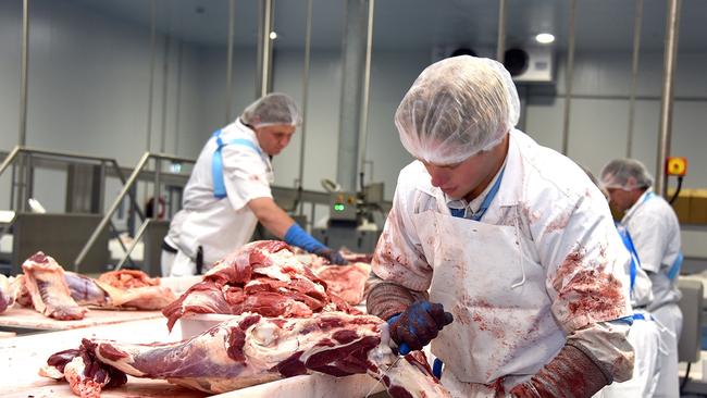 Action inside the new meatworks, where the Angus siblings also work hands-on. Pictures: John Elliott