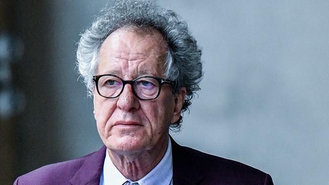 Australian actor Geoffrey Rush (left) arrives at the Federal Court in Sydney, Wednesday, October 24, 2018. Rush is suing Nationwide News for defamation. (AAP Image/Brendan Esposito) NO ARCHIVING