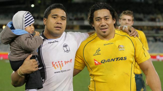 Brothers Campese (L) and Salesi Ma'afu after the Australia v Fiji international match at Canberra Stadium in Canberra.