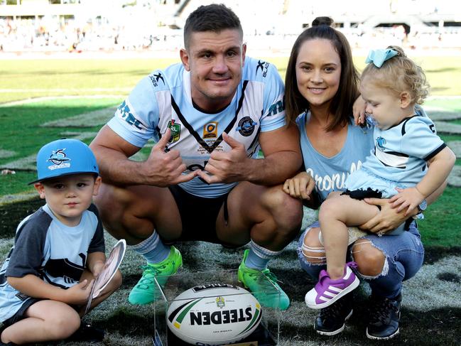 Shark's Chris Heighington with his family after his 300th during NRL game between the Cronulla Sharks and the Newcastle Knights at Southern Cross Group Stadium , Cronulla . Picture : Gregg Porteous