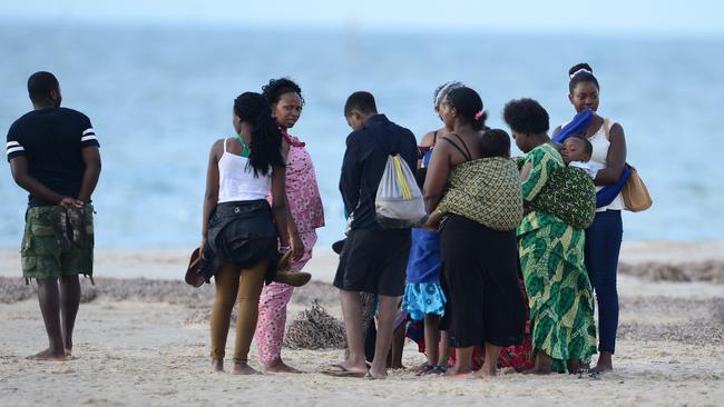 The victims’ relatives and friends at the scene of the tragedy. Picture: Tom Huntley