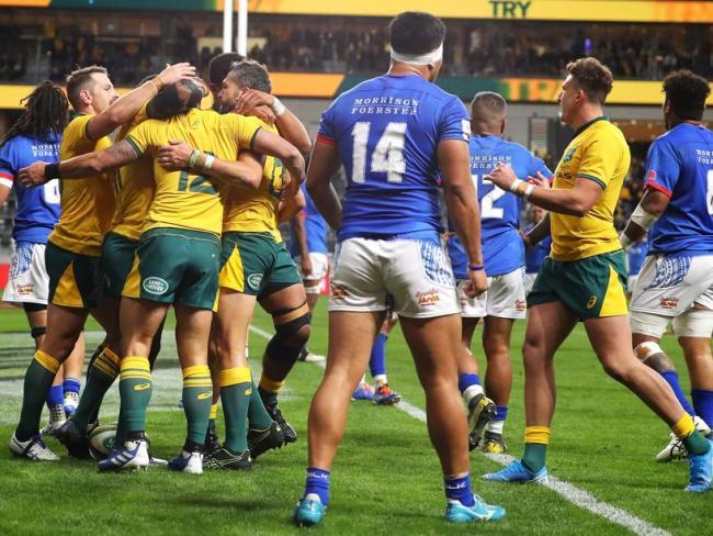 Adam Ashley-Cooper of the Wallabies celebrates with his team mates after scoring a try. Picture: Mark Kolbe/Getty Image