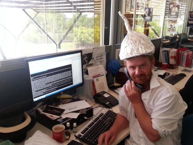 The author knows it is important to protect yourself with a tin foil hat when reporting on paranormal activities.