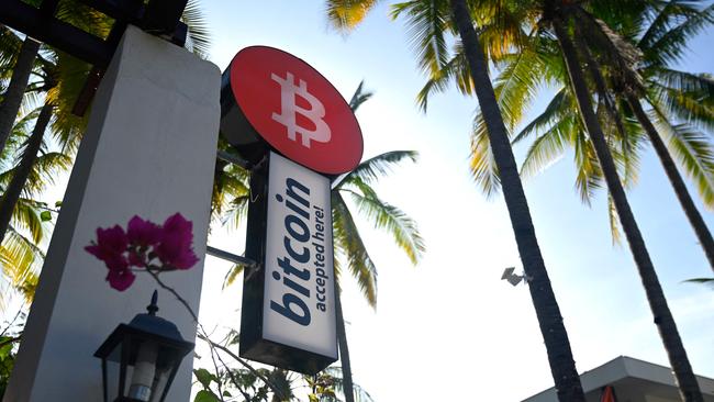 A sign promoting bitcoin transactions is seen outside a hotel in El Zonte beach, El Salvador. Picture: Marvin Recinos/AFP