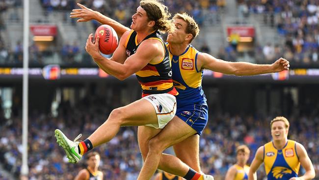 Sam Berry competes for a mark with Brad Sheppard of the Eagles. Picture: AFL Photos via Getty Images