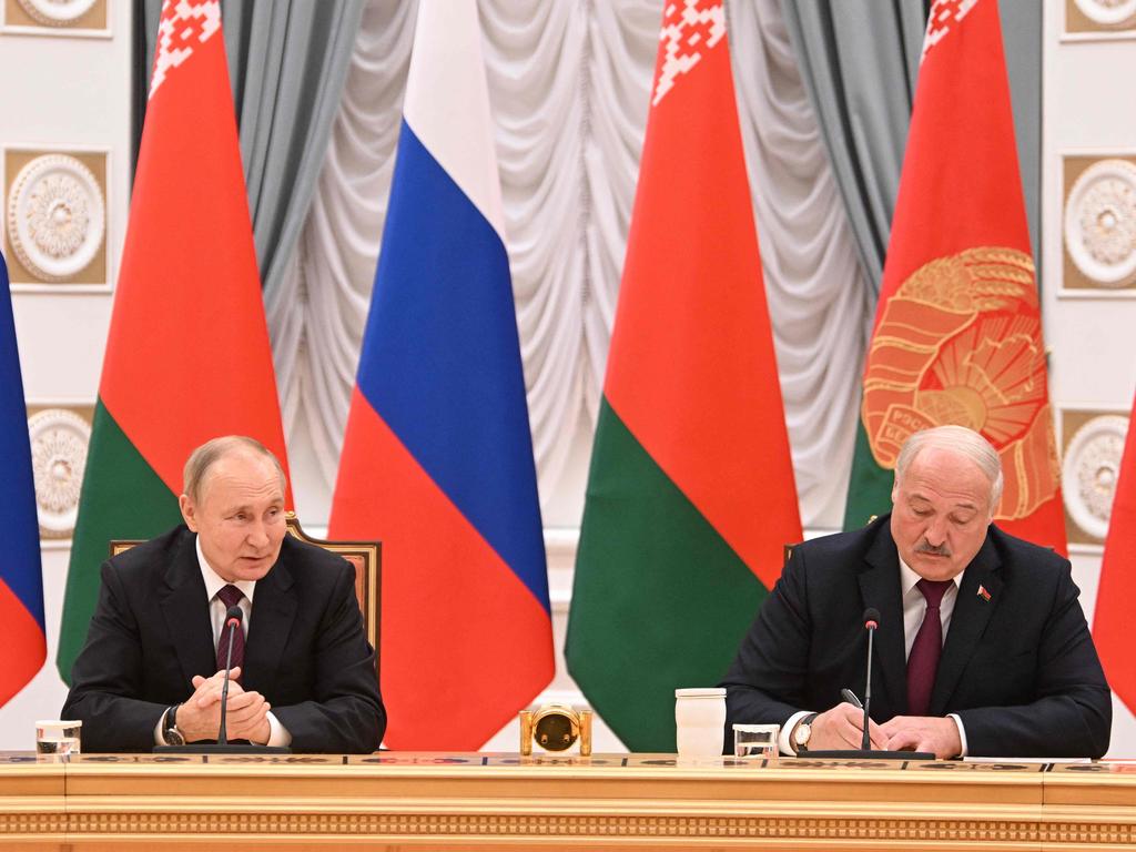 Russian President Vladimir Putin (L) and Belarusian President Alexander Lukashenko during their meeting at the Palace of Independence in Minsk. Picture: Sputnik / AFP