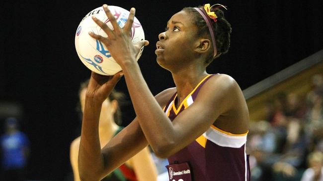 Romelda Aiken in action for the Queensland Firebirds in 2008, the year she entered the league. Picture: Peter Wallis