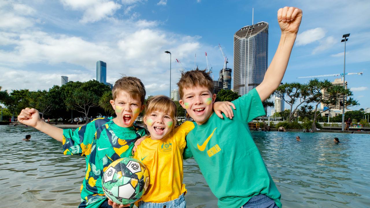 (l-r) Hugo Egan, Magnolia Egan and George Egan can’t wait for next year’s women’s World Cup soccer matches in Brisbane. Picture: Richard Walker