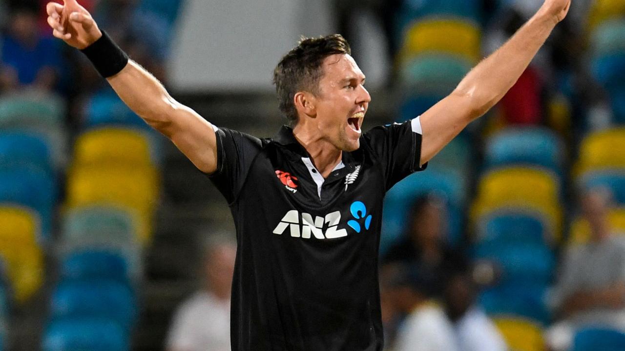 Trent Boult of New Zealand celebrates the dismissal of Kyle Mayers of West Indies during the 2nd ODI match between West Indies and New Zealand at the Kensington Oval in Bridgetown, Barbados, on August 19, 2022. (Photo by Randy Brooks / AFP)