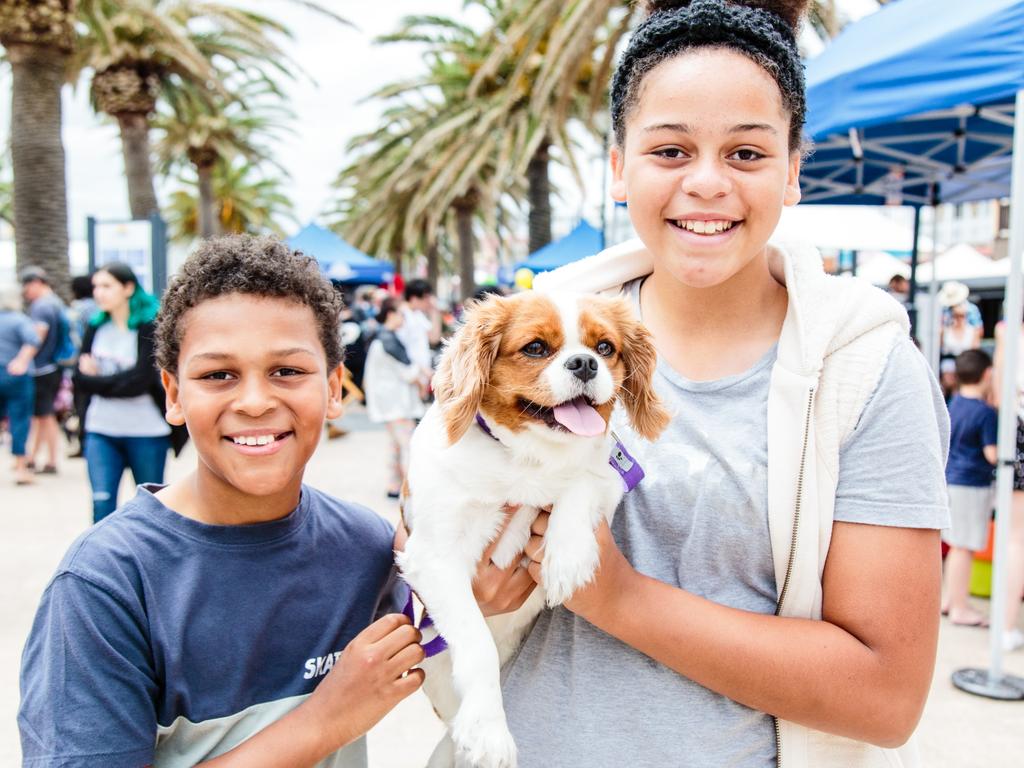 Ellis and Jorja Foster with Daphne the dog at the Glenelg Christmas Pageant:. Picture: Helen Page