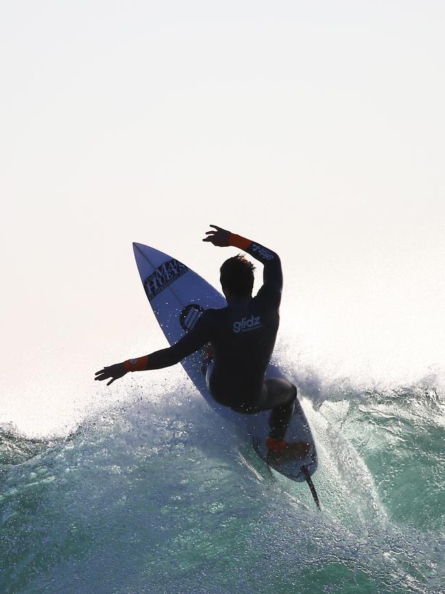 A surfer at Lennox Head / Picture: Dylan Robinson