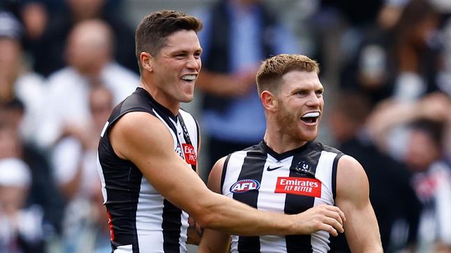 Jack Crisp with teammate Taylor Adams. Picture: Michael Willson/AFL Photos via Getty Images