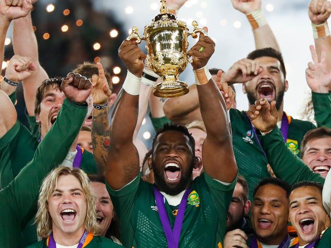 South African captain Siya Kolisi lifts the Rugby World Cup trophy.