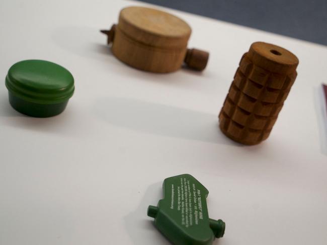 Replicas of antipersonnel landmines prohibited under the Mine Ban Treaty. Picture: AFP