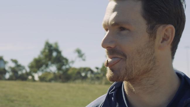 Patrick Dangerfield chows down on crickets