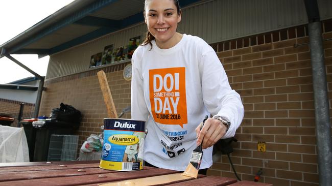 Hills Shire Times’ Stacey Roberts painting a desk.