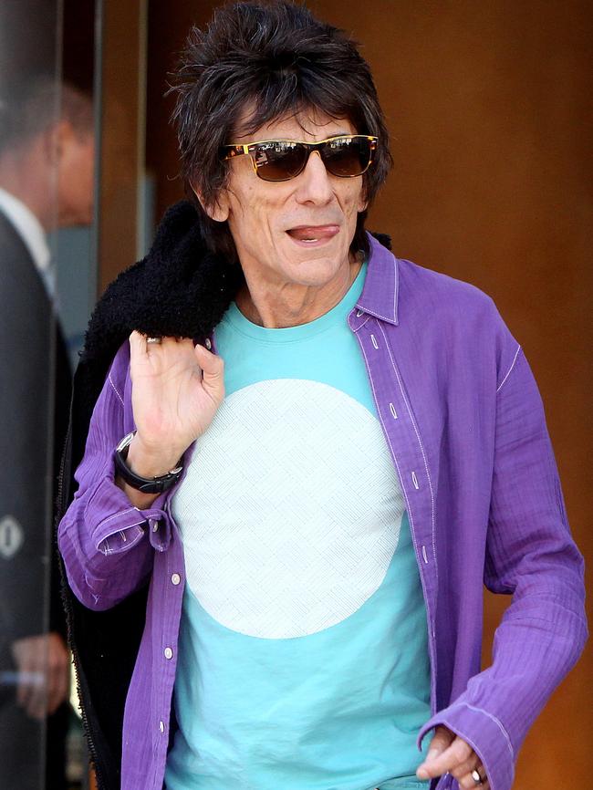 All mapped out ... Ronnie Wood leaves the Intercontinental Hotel in Adelaide. Picture: Calum Robertson