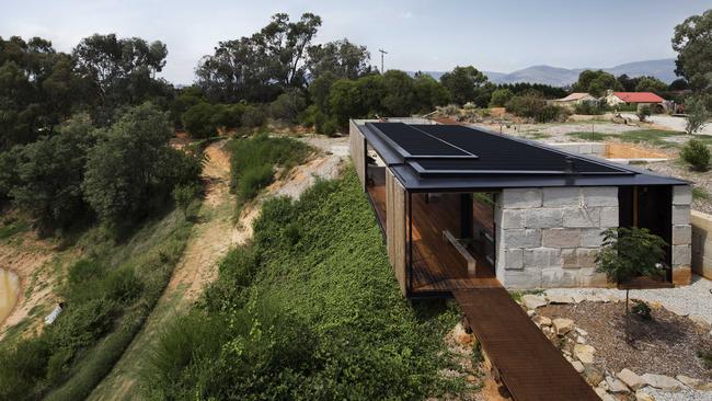 Sawmill House, Yackandandah, was cantilevered over an old dam. Picture: Ben Hosking