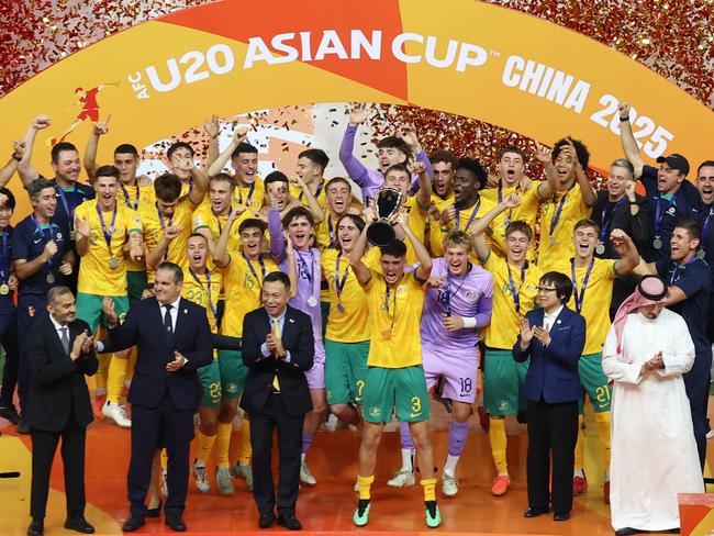 The Young Socceroos celebrate winning the U20 Asian Cup in China.