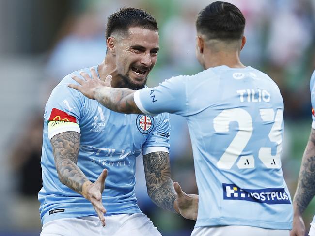 Marco Tilio (right) celebrates with his Melbourne City teammate Jamie Maclaren. Picture: Daniel Pockett / Getty Images