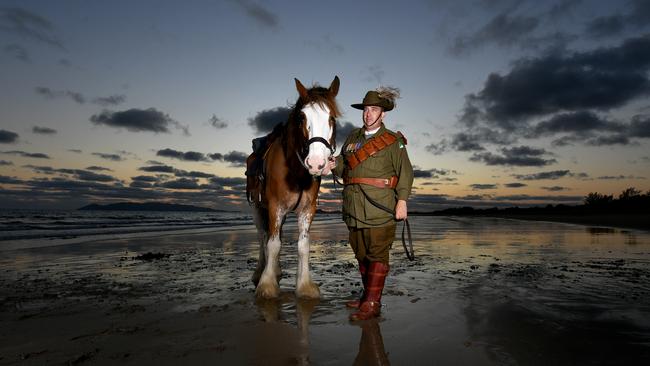 Veteran Jason Mengel with Gabriel from the 27th Lighthorse Regiment with Sox at dawn at Saunders Beach will be on parade for Remembrance Day. Picture: Evan Morgan