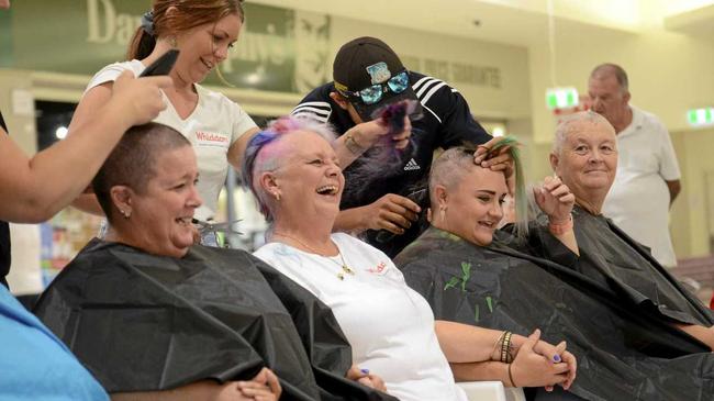 CLOSE SHAVE: Staff from Whiddon Aged Care get some cool winter styles during a charity event at Grafton Shoppingworld on the weekend. Picture: Tim Jarrett