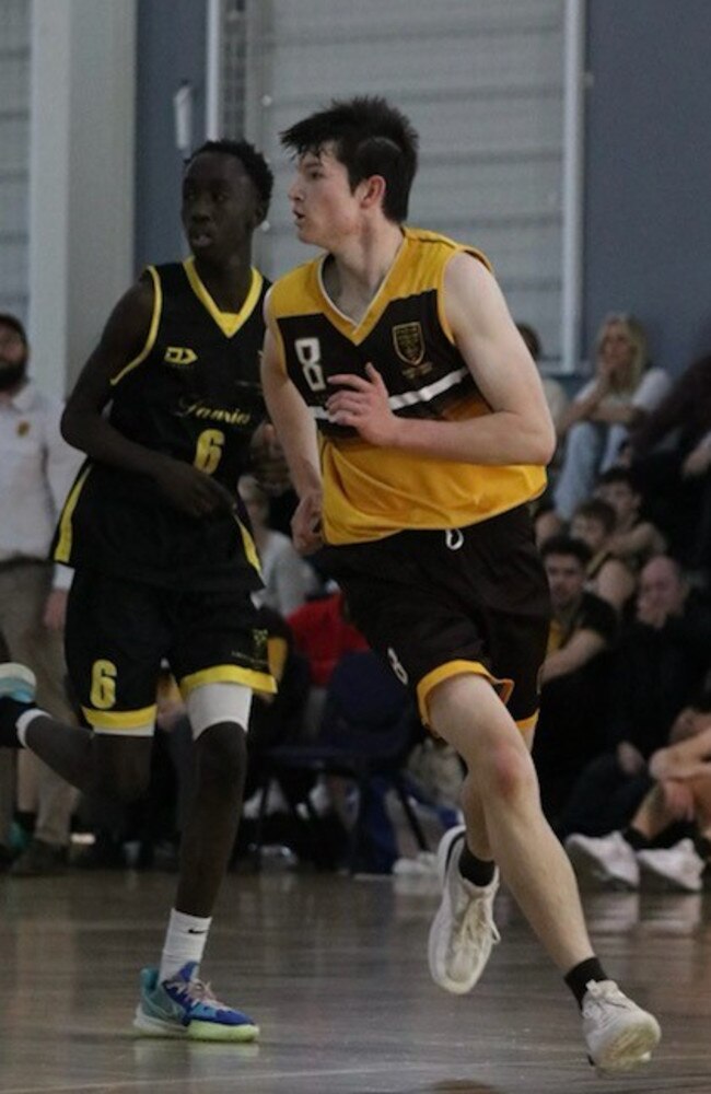 Padua and Lauries' First V basketballers in action.