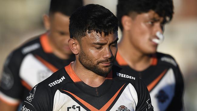 David Nofoaluma of the Tigers walks from the field.