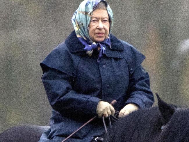 GROUP PRINT AND WEB RIGHTS: PICTURE: BACKGRID.  Windsor, UNITED KINGDOM  - HM Queen Elizabeth II smiling while riding on her pony accompanied by Terry Pendry along the banks of the River Thames on 4th December 2017 in Home Park Windsor UK.  Pictured: Queen Elizabeth II  BACKGRID Australia 4 DECEMBER 2017