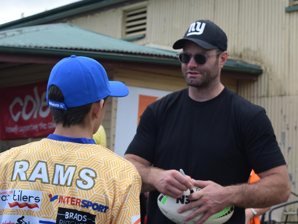 Ex-NRL great Boyd Cordner visiting the Lismore Showground with rugby balls, jerseys and other gifts for the community as part of NSW Rugby League's flood assistance. Picture: Nicholas Rupolo