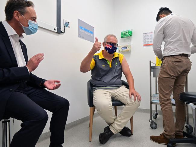 Greg Hunt with Scott Morrison at the Castle Hill Medical Centre in Sydney. Picture: AFP.