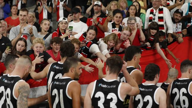 St Kilda fans cheer off their team after their fourth win in a row. Picture: Getty Images