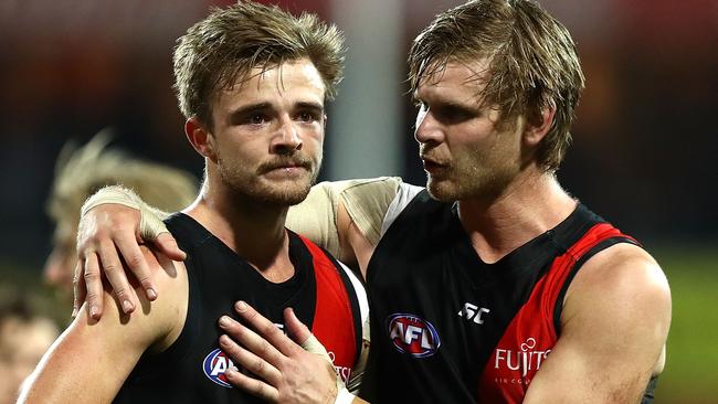 Michael Hurley talks to Marty Gleeson after Essendon’s loss to Sydney last Friday night. Picture: Getty