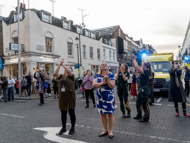 Members of the British public take part in a national "clap for carers" to show thanks for the work of NHS workers. Picture: AFP.