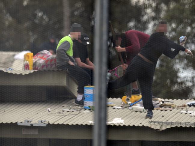 Detainees are seen during a riot at the Frank Baxter Juvenile Justice Centre, Kariong, NSW, Monday, July 22, 2019. A riot has broken out at a NSW juvenile justice centre on the Central Coast where several inmates have climbed onto the roof and five inmates have been stabbed. Picture: AAP / Dean Lewins