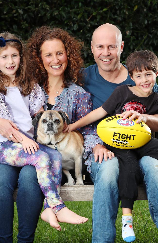 Treasurer, Josh Frydenberg at home with his family in Hawthorn. Melbourne. L-R Gemma 7, Amie, dog Fonzi, Josh and Blake 5. Picture Rebecca Michael.