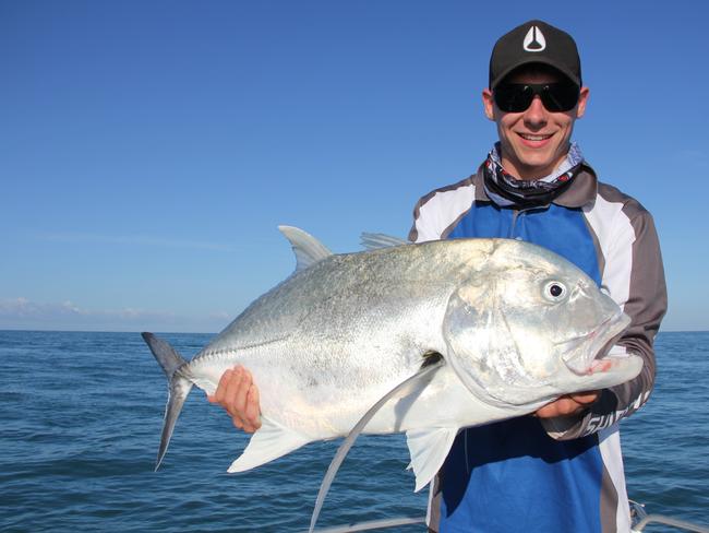 Angler Jacob Scott with a solid giant trevally he jigged up.