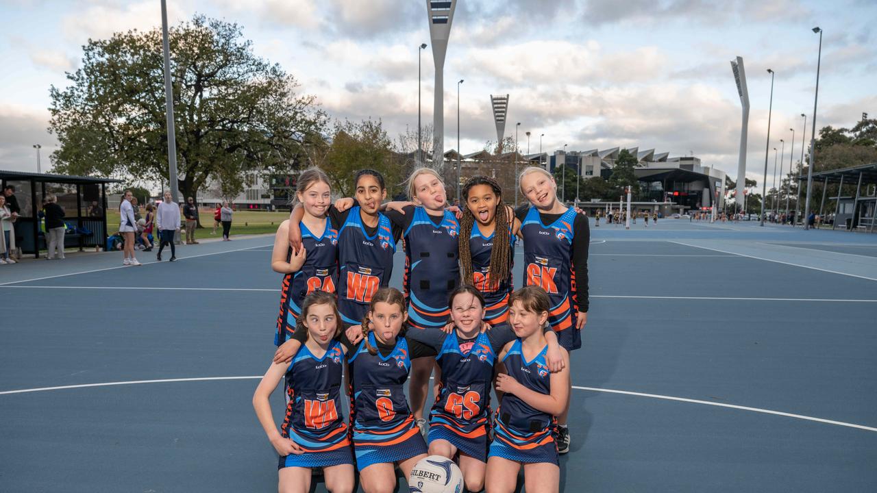 Armstrong Creek Pink Sharks under-11 netball team pull their funniest faces.