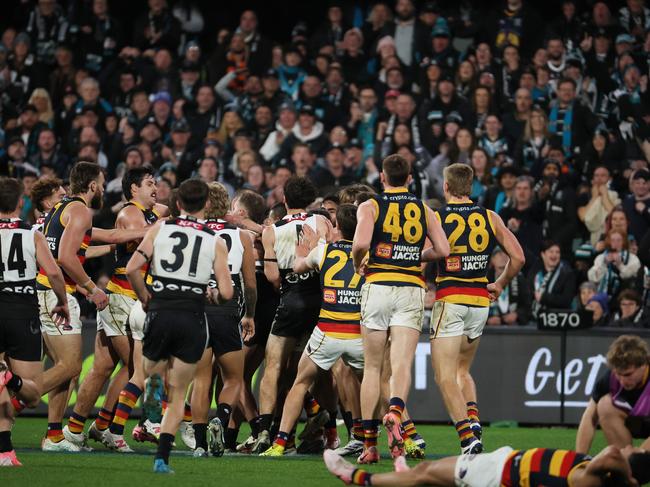 A melee erupted immediately after the incident. Picture: James Elsby/AFL Photos