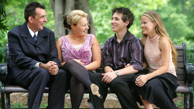 Craig Pareezer (L) with his family after winning his initial compensation case against Coca-Cola in 2004. Picture: Nathan Edwards